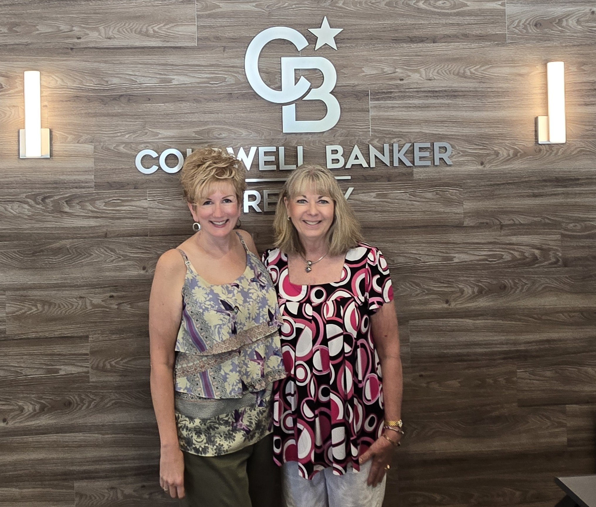 Pam Devendorf celebrating her friendship with Managing Broker Cheri Hagan!